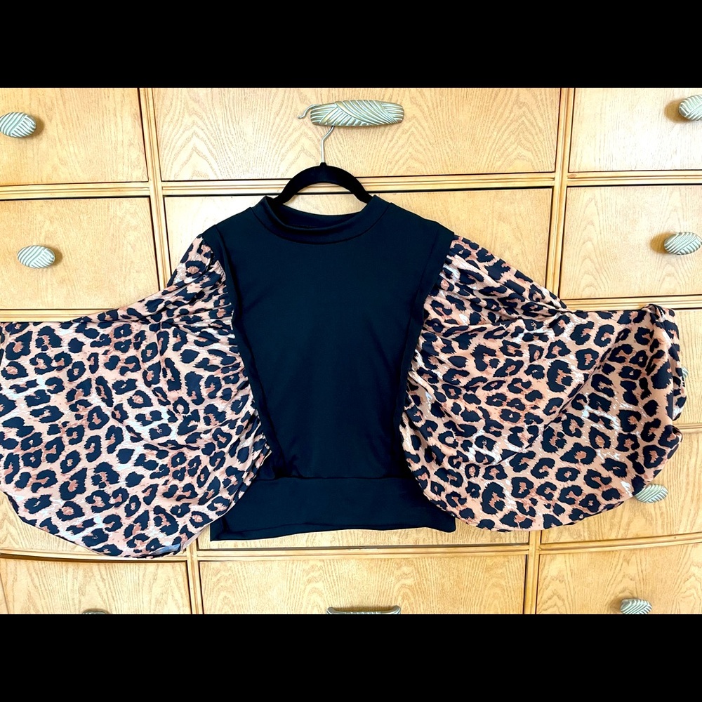 Leopard print balloon sleeve womens top.